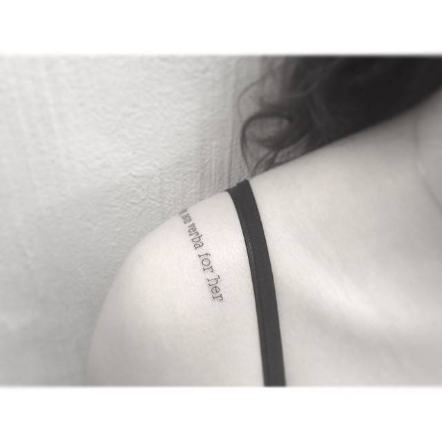 Typewriter font Englishtye quote tattoo located on the shoulder.