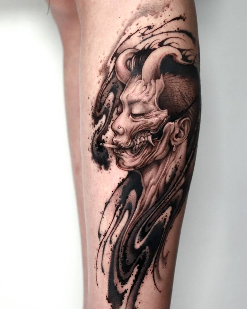 Devil Jay Park tattoo located on the shin, black and grey style.