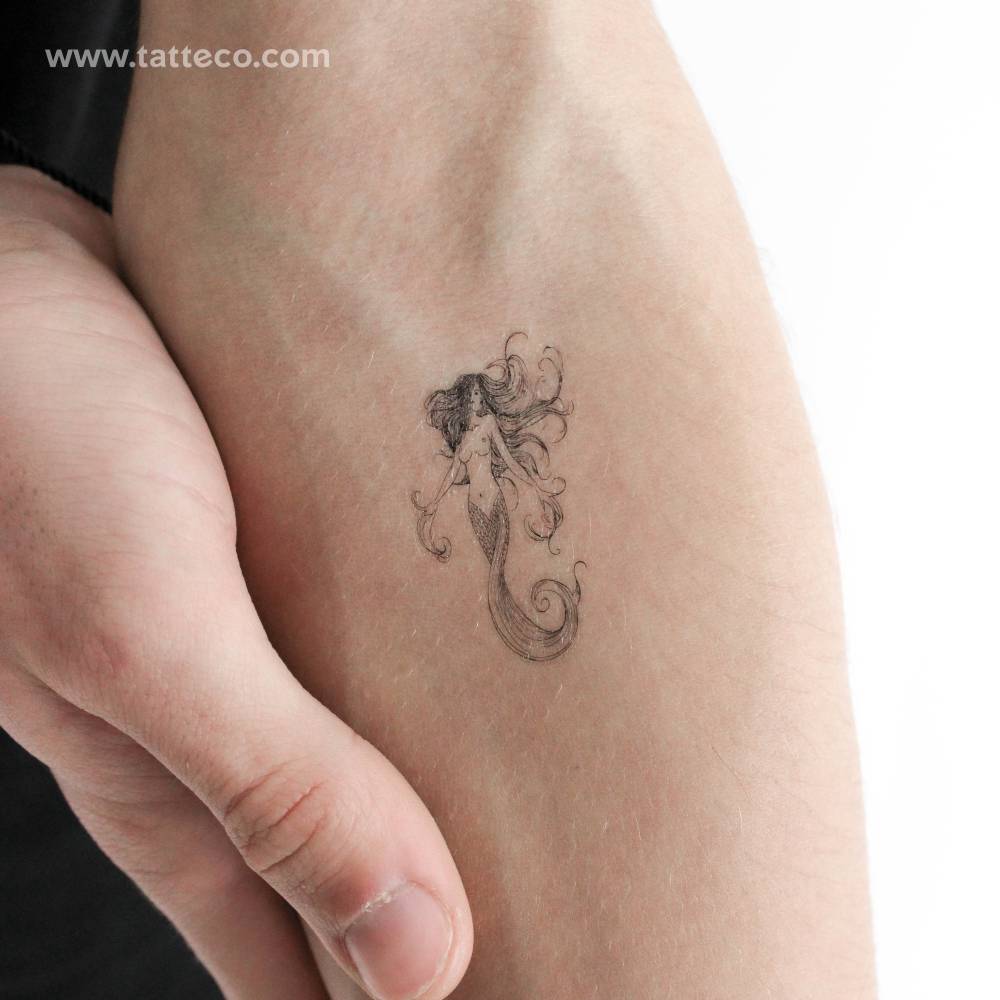Mermaid temporary tattoo located on the inner forearm.