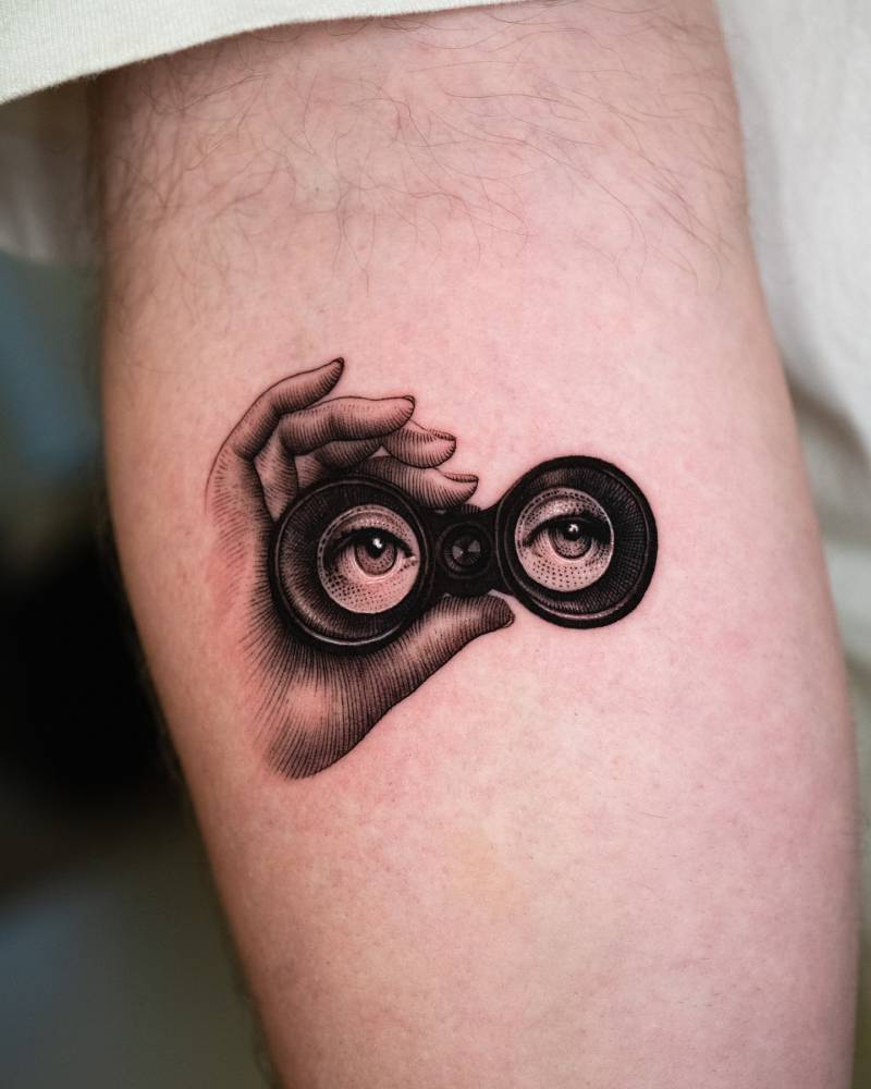 Micro-realistic style Fornasetti 371 tattoo located on the inner forearm.
