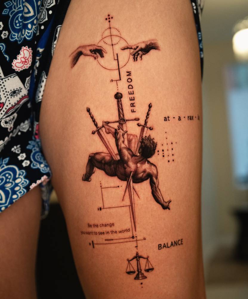 Graphic style Phaeton tattoo located on the thigh.