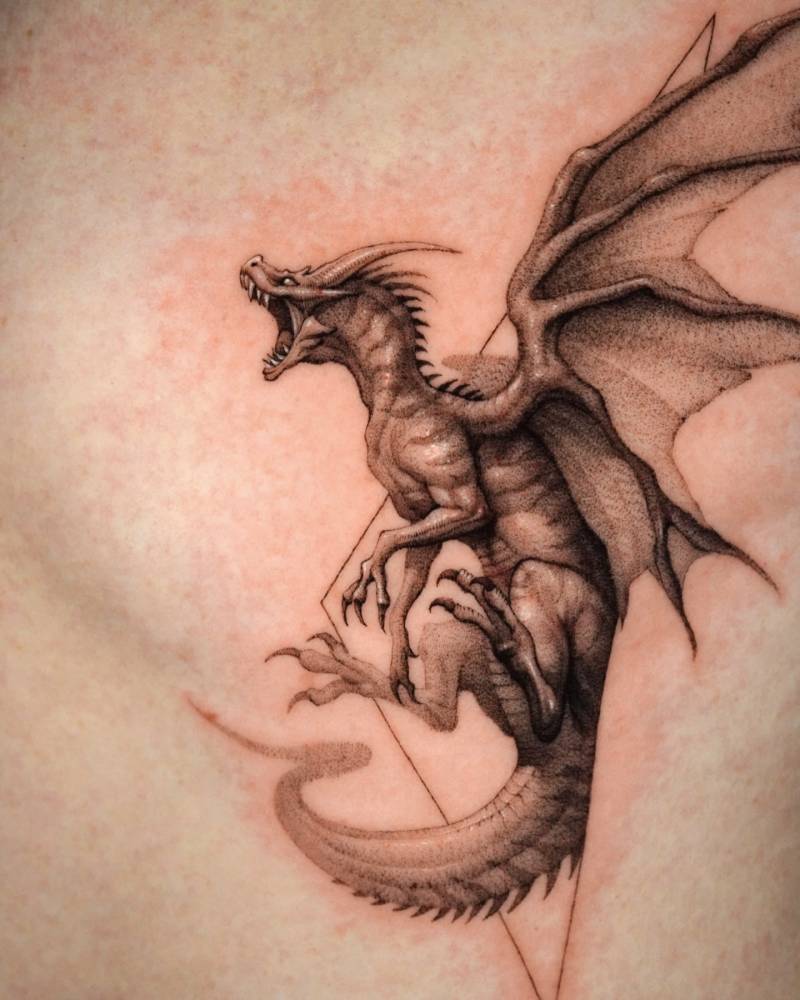 Dragon tattoo in micro-realistic style placed on the rib.