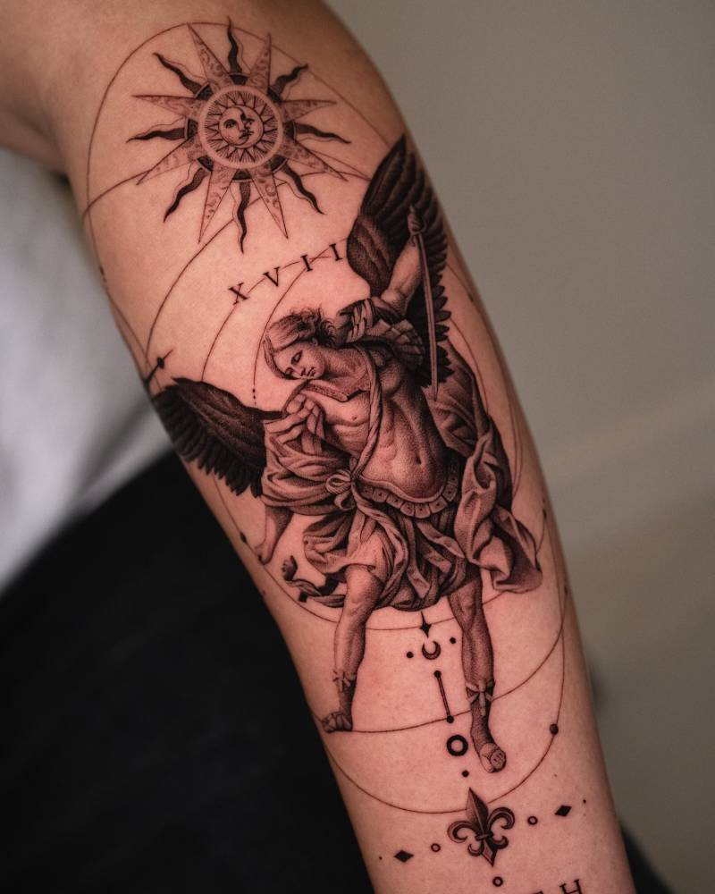 Archangel Michael tattoo in micro-realistic style located on the forearm.