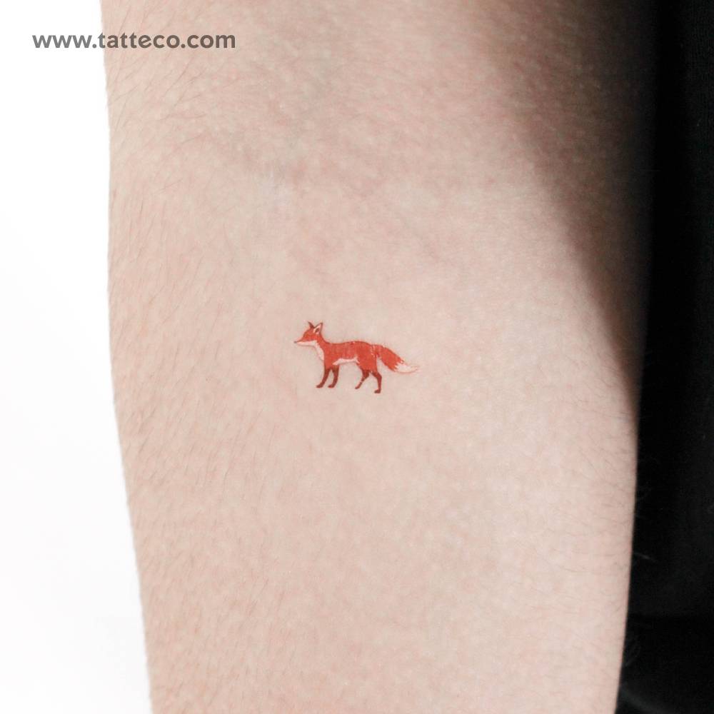 Watercolor style fox temporary tattoo located on the inner forearm.