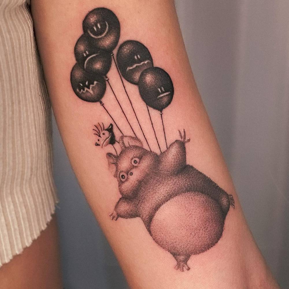 Dotwork style 'Spirited Away' tattoo located on the inner arm.