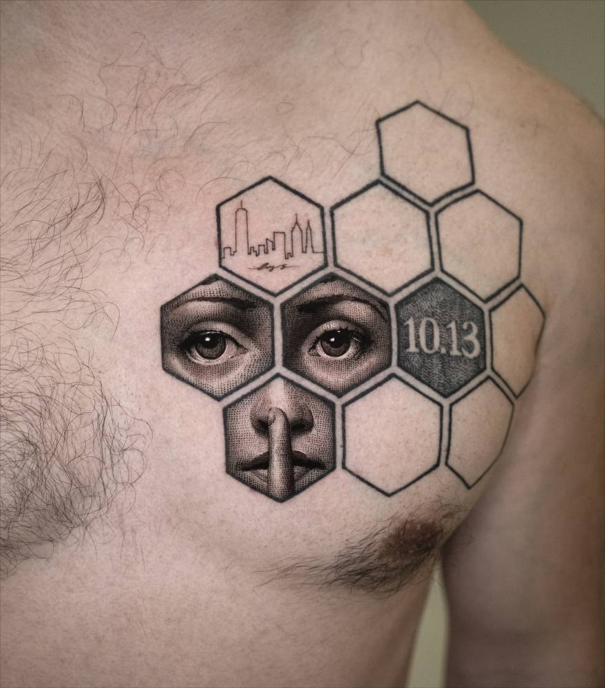 Piero Fornasetti 334 tattoo located on the chest.