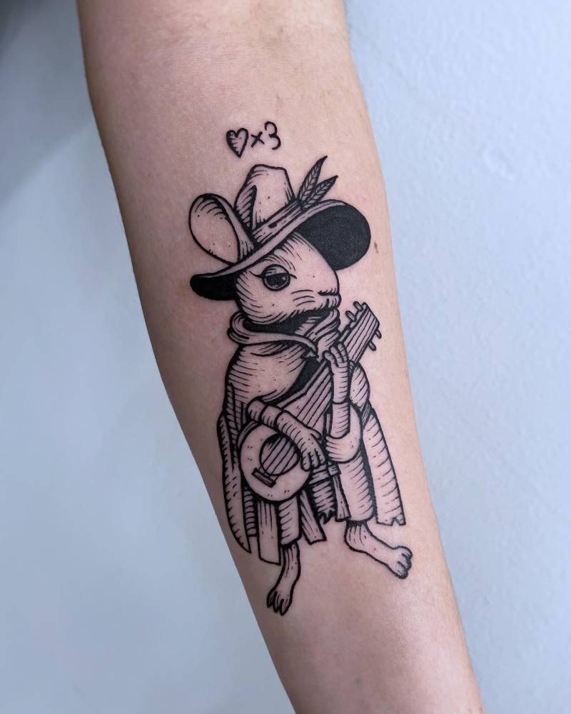 Bard mouse tattoo located on the inner forearm, engraving style.