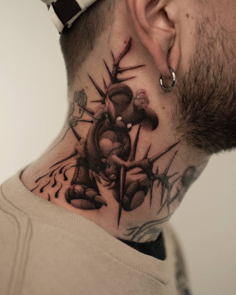 Teddy bear and thorns tattoo in dowtork style located on the neck.