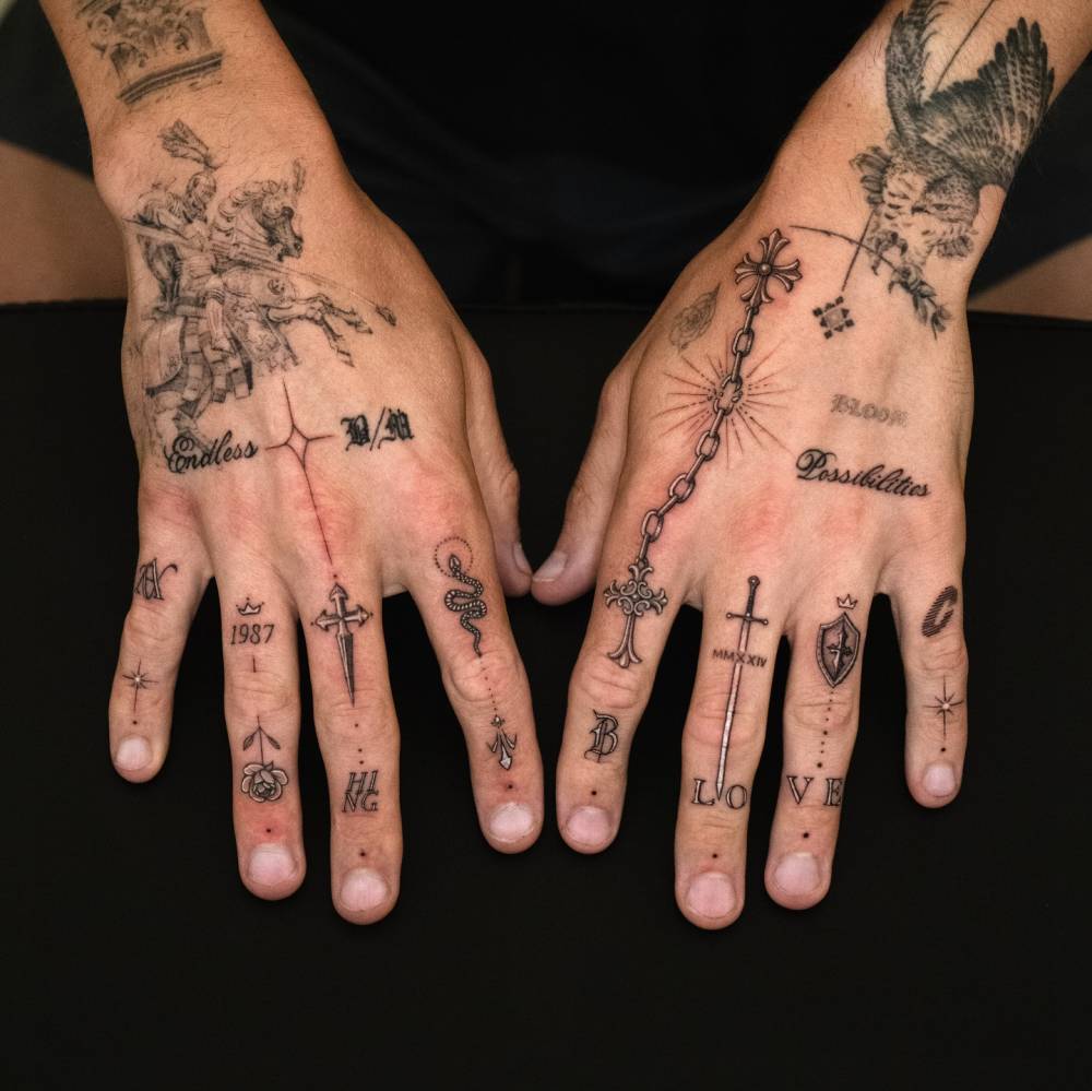 Individual matching hand composition tattoos.