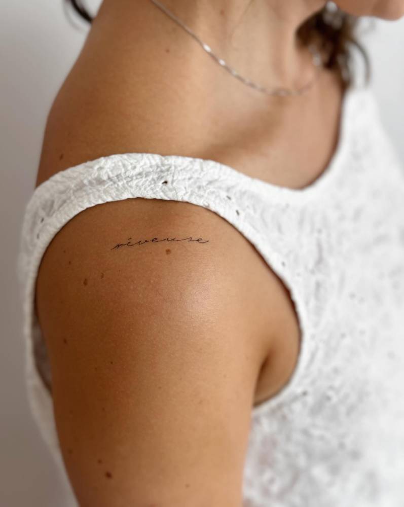"Seveused" lettering tattoo located on the shouder (healed).