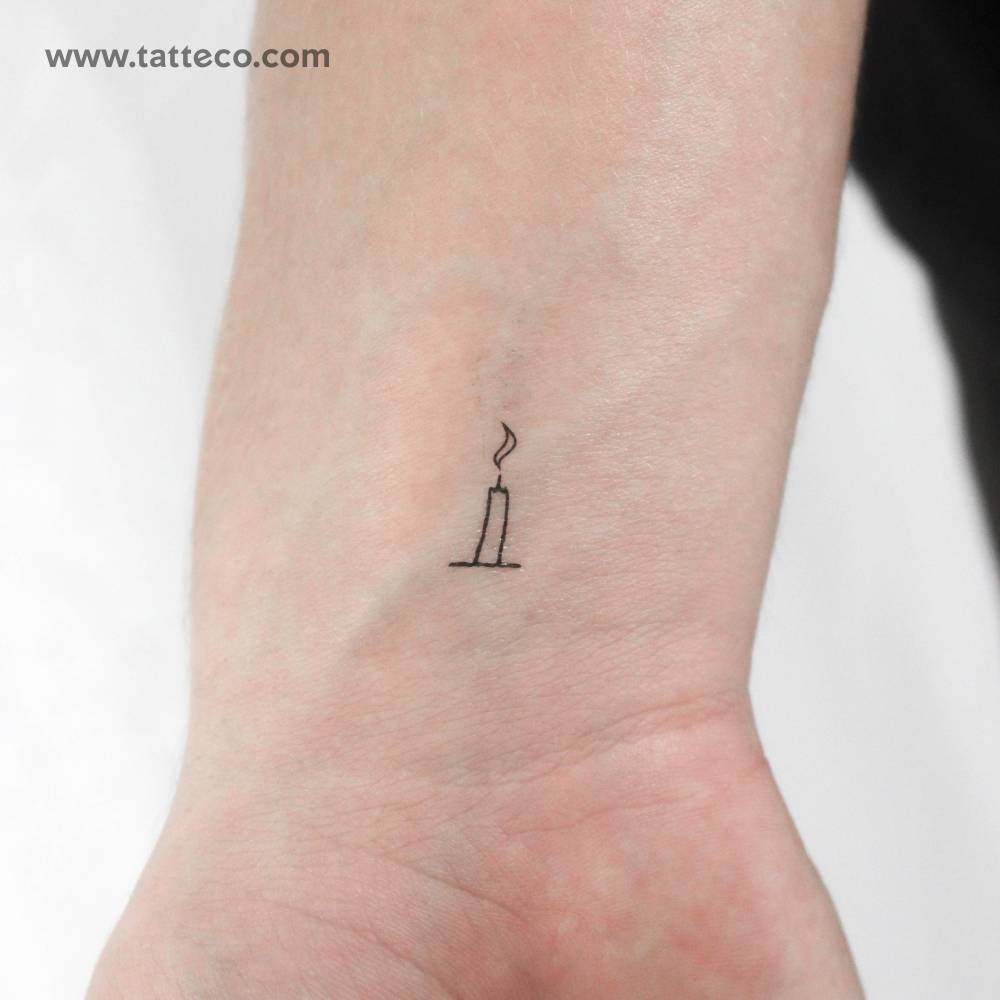 Minimalist candle temporary tattoo located on the wrist.