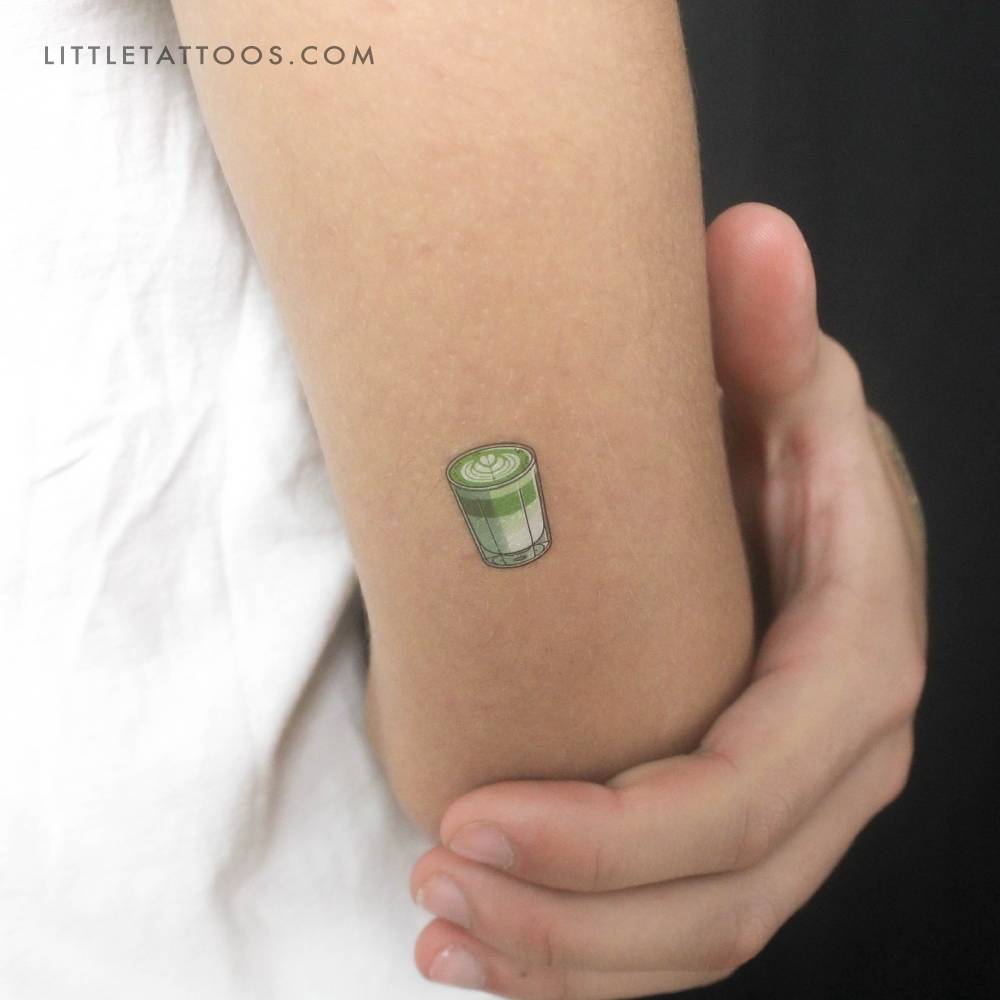 Matcha latte temporary tattoo located on the tricep.