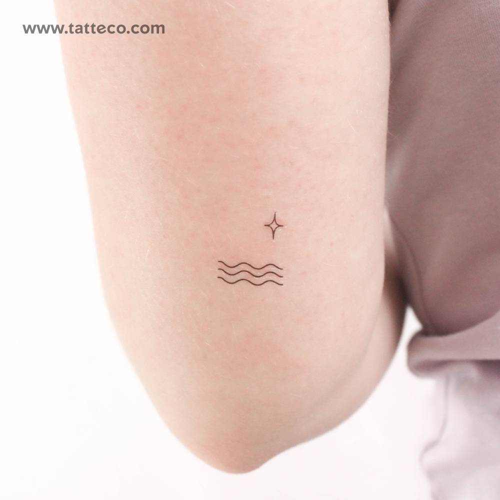 Sea and star temporary tattoo located on the tricep.