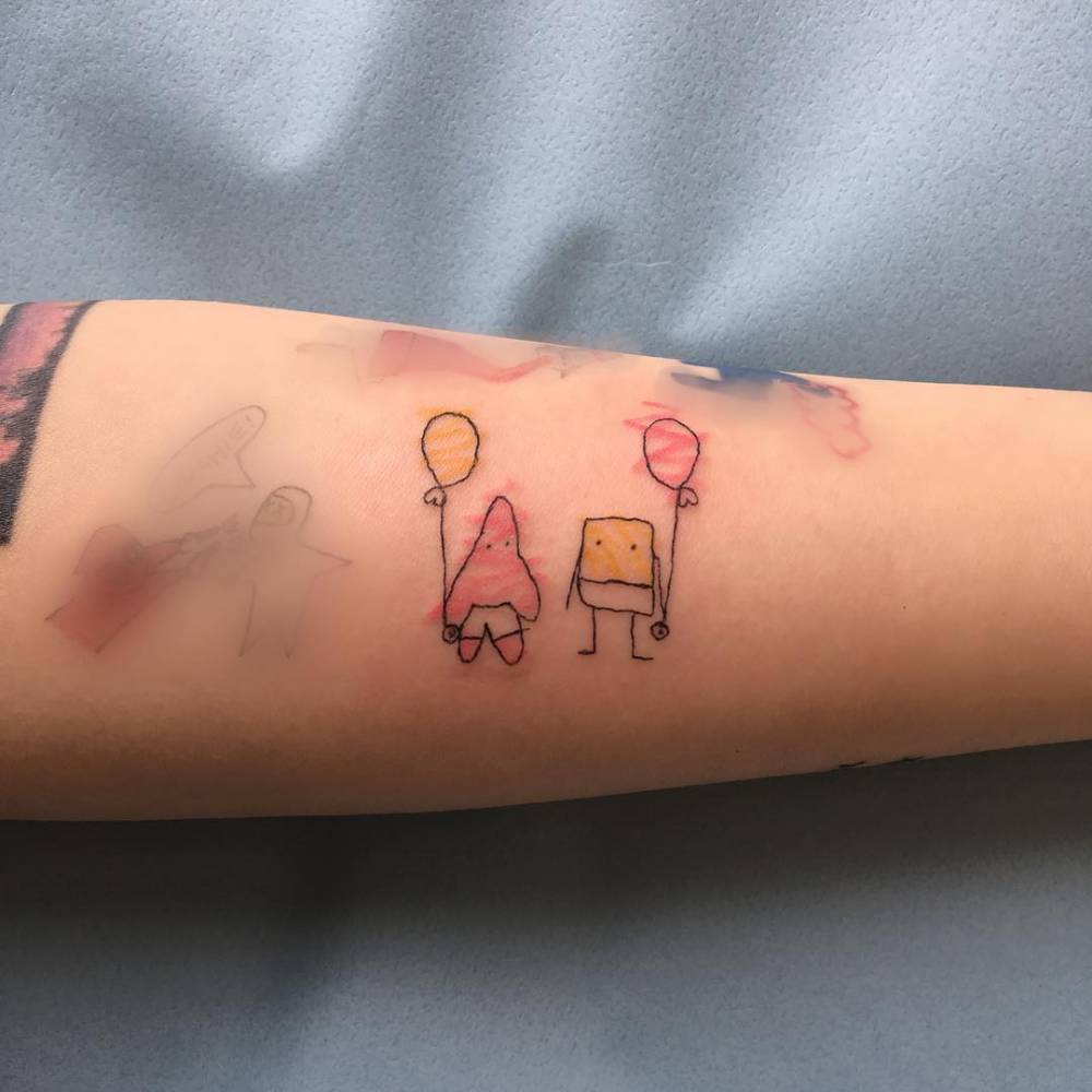 Ignorant style Patrick Star and Spongebob tattoo located on the inner forearm.