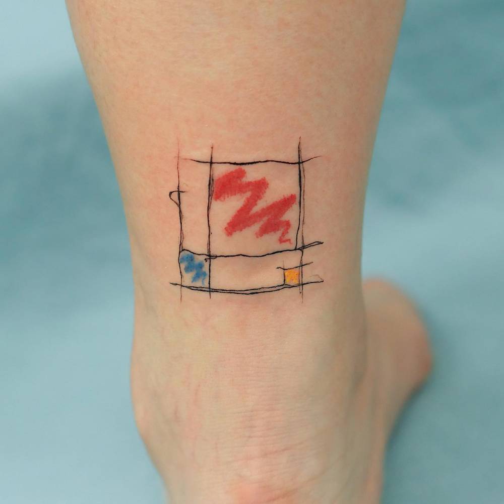 Mondrian's artwork tattooed on the achilles.