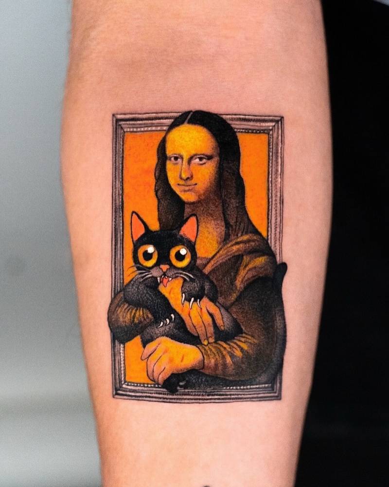 Mona Lisa holding a black cat tattooed on the inner forearm.
