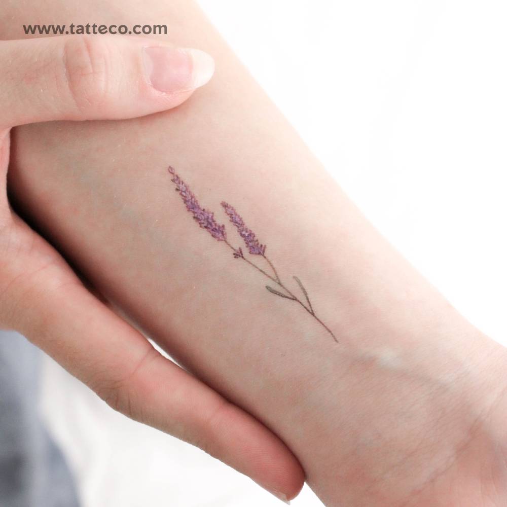 Watercolor style lavender temporary tattoo located on the wrist.