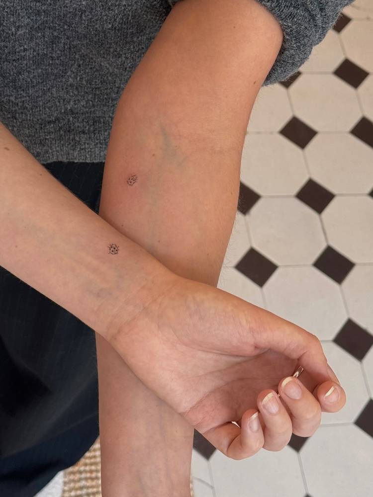 Matching minimalistic ladybug tattoo for best friends.