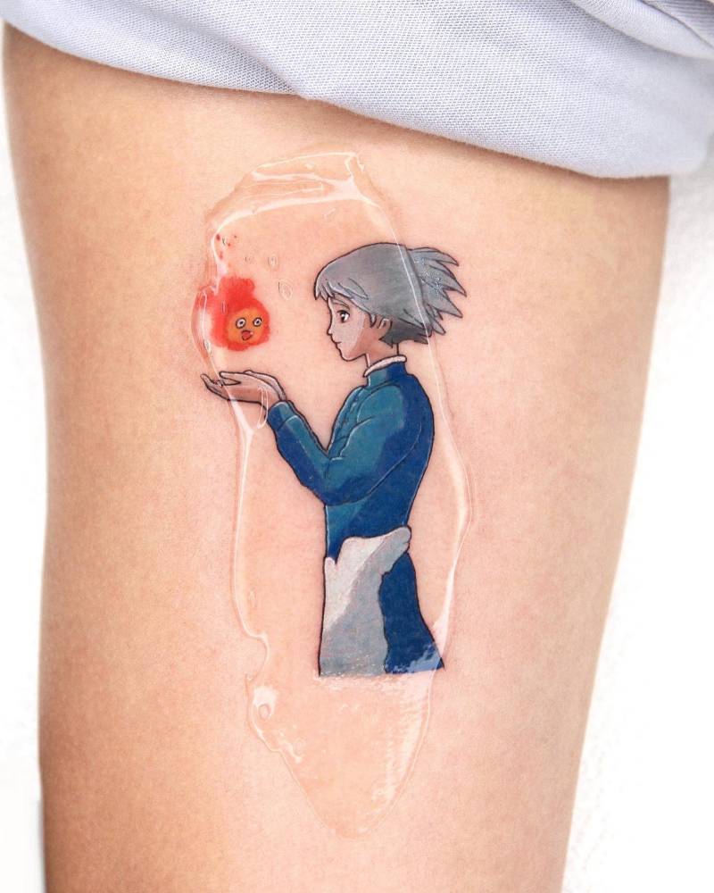 Cartoon style Sophie Hatter and Calcifer tattoo located on the inner arm.