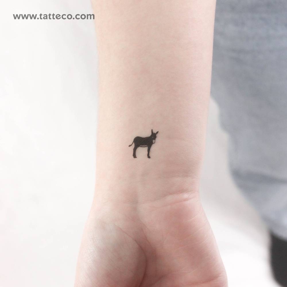 Small donkey temporary tattoo placed on the wrist.