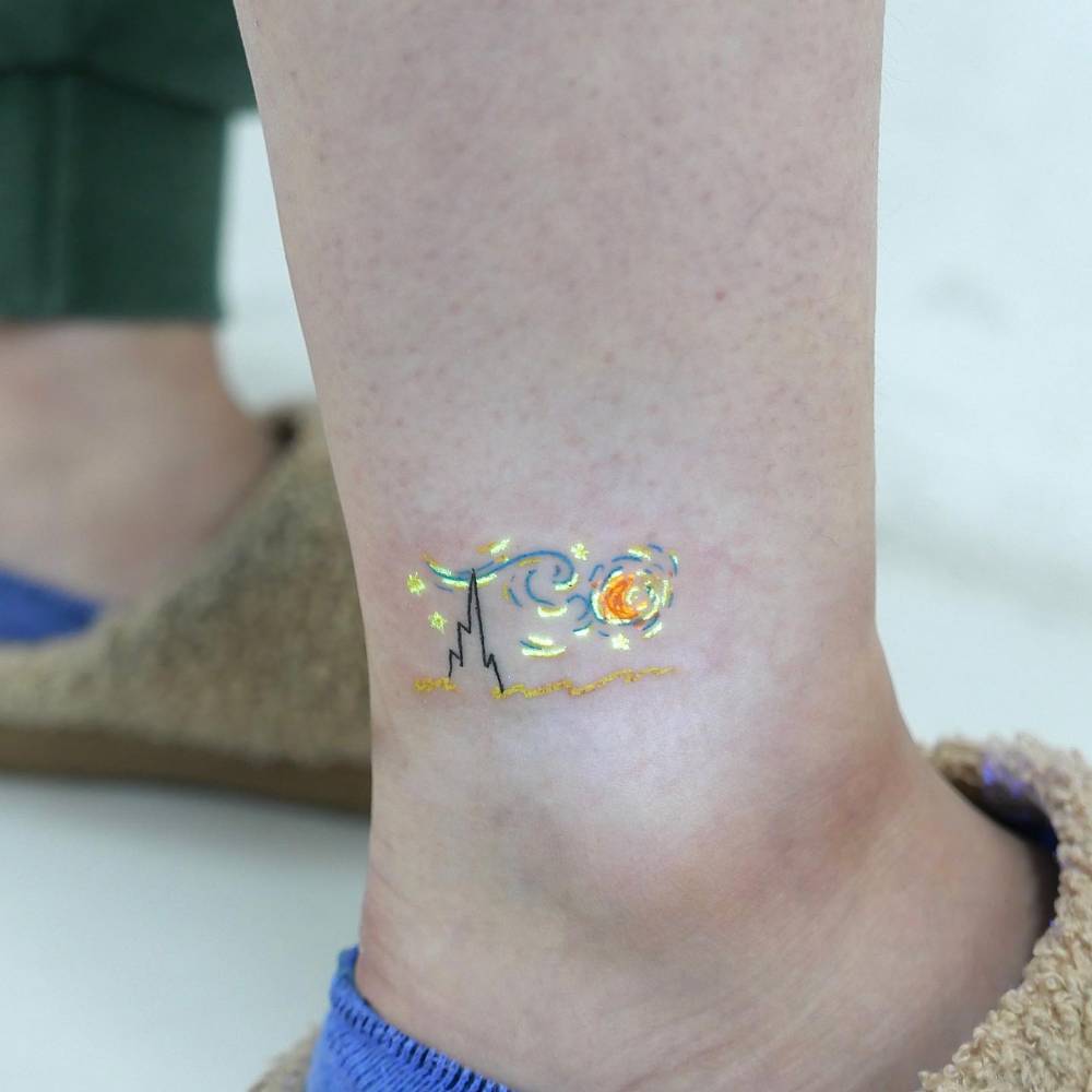 Minimalistic style 'The Starry Night" tattoo located on the ankle.