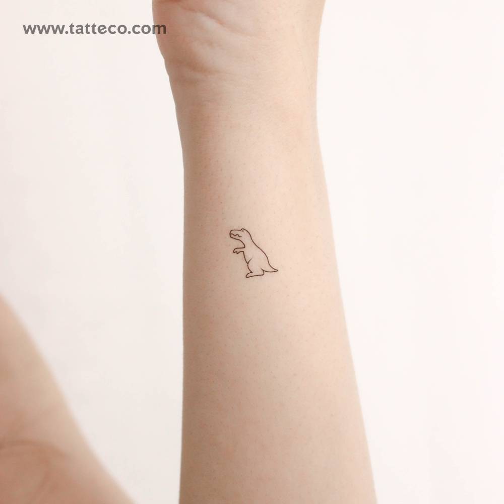 Small minimalistic T-Rex temporary tattoo located on the wrist.