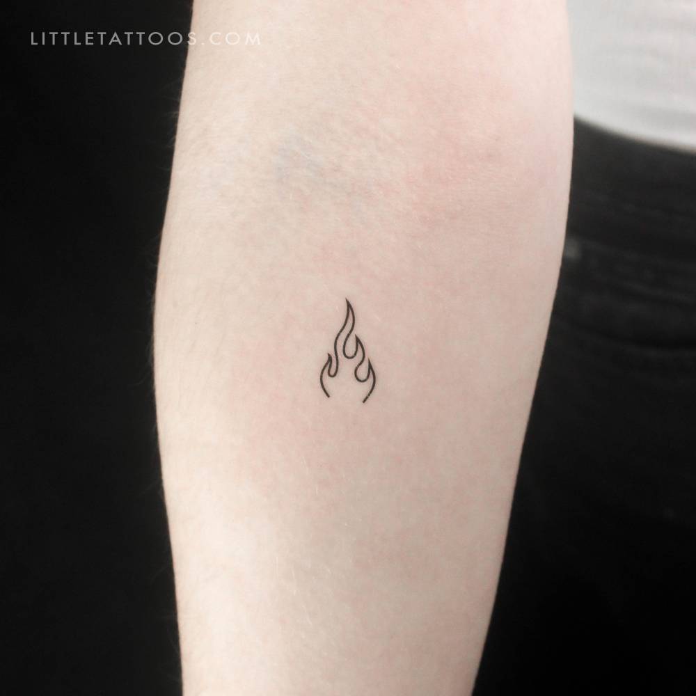 Minimalist flame temporary tattoo done on the inner forearm.