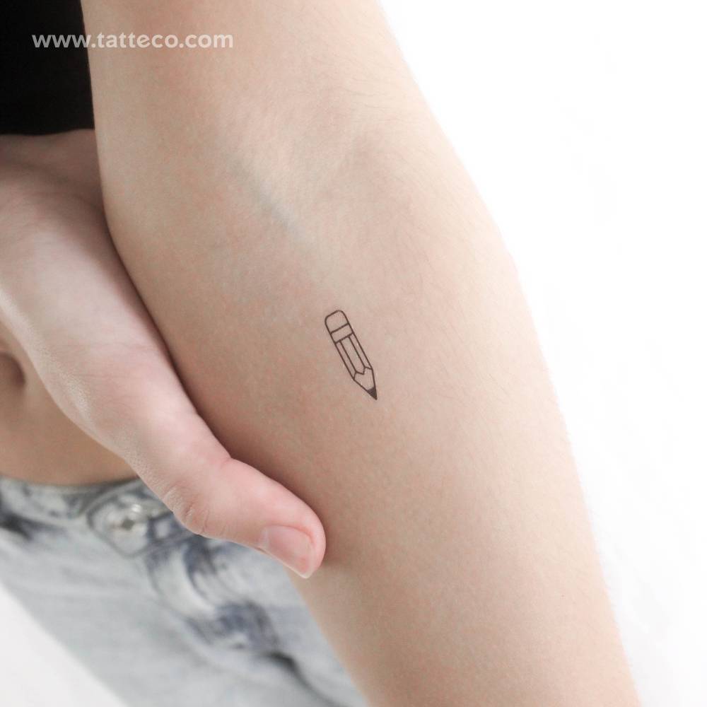 Tiny minimalistic pencil temporary tattoo located on the inner forearm.