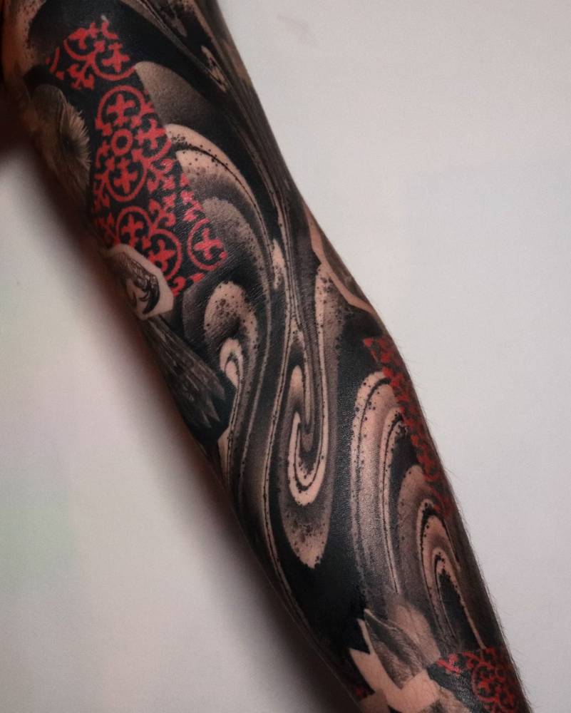 Graphic style tattoo sleeve.