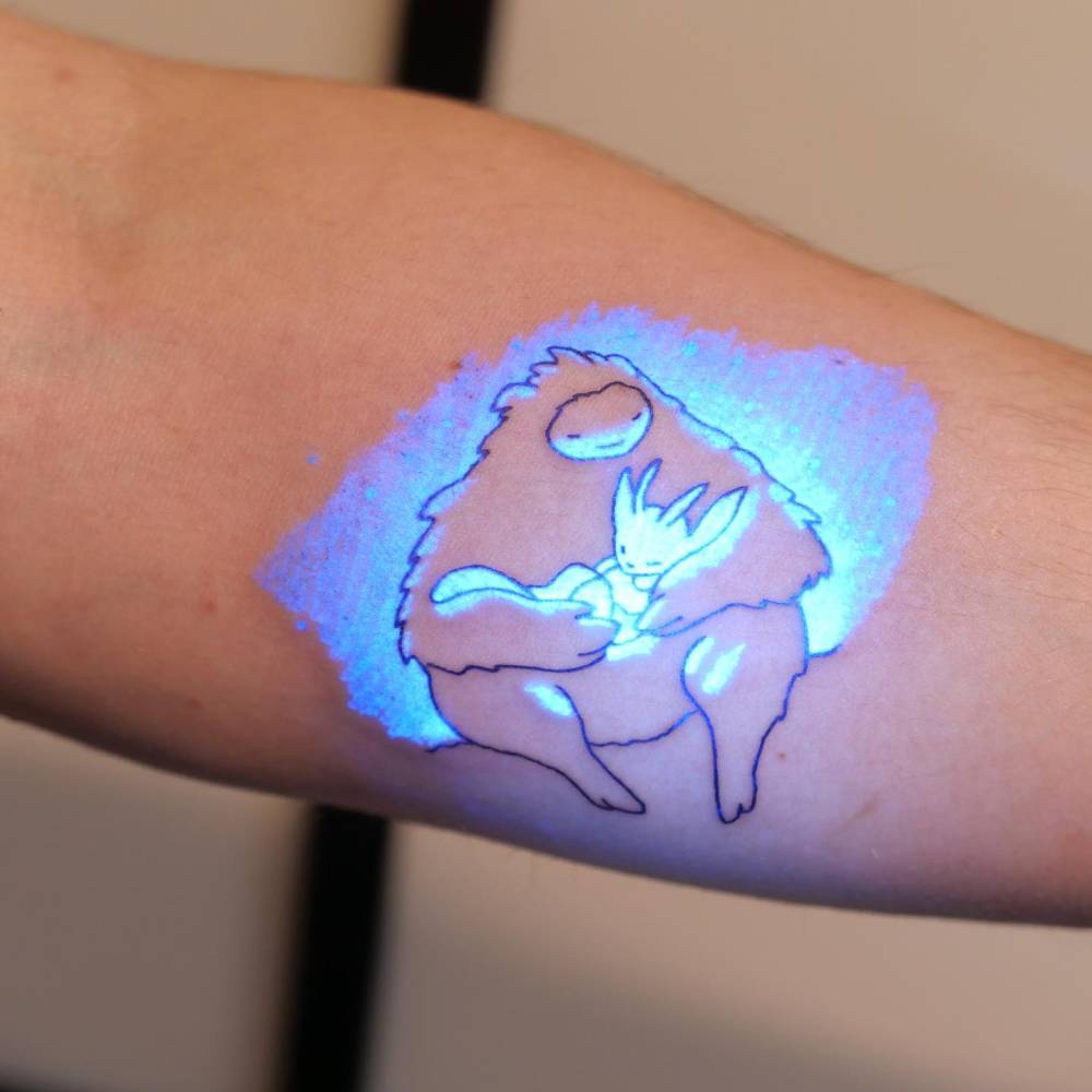 Ori and the Blind Forest tattoo located on the inner forearm.