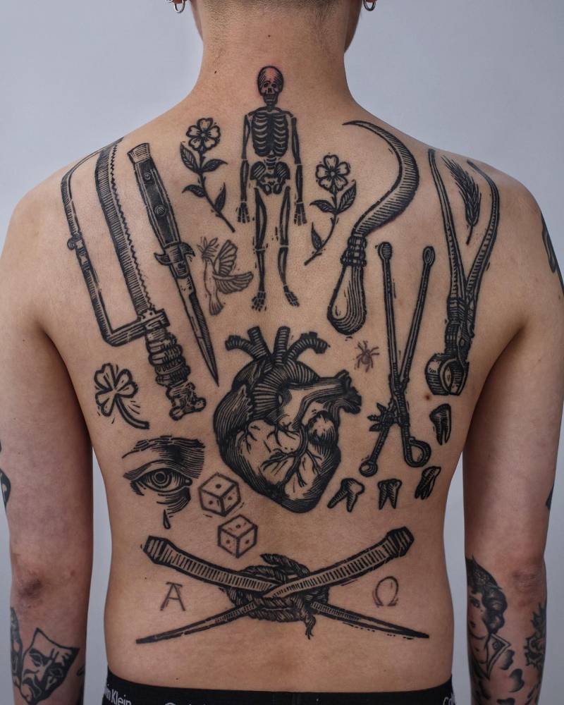 Back composition tattoos in engraving style.