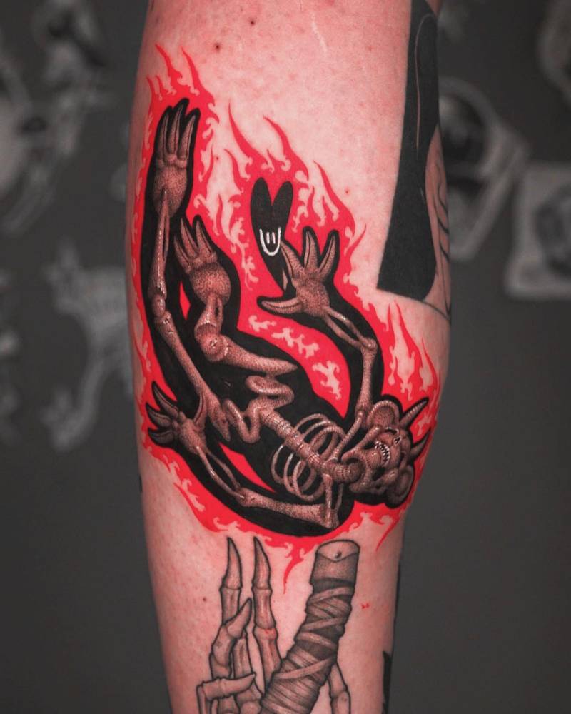 X-ray devil teddy bear tattoo located on the calf.
