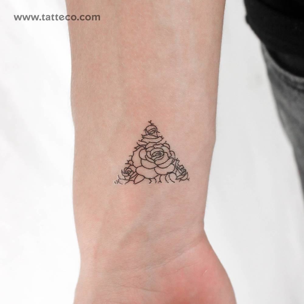 Rose triangle temporary tattoo located on the wrist.