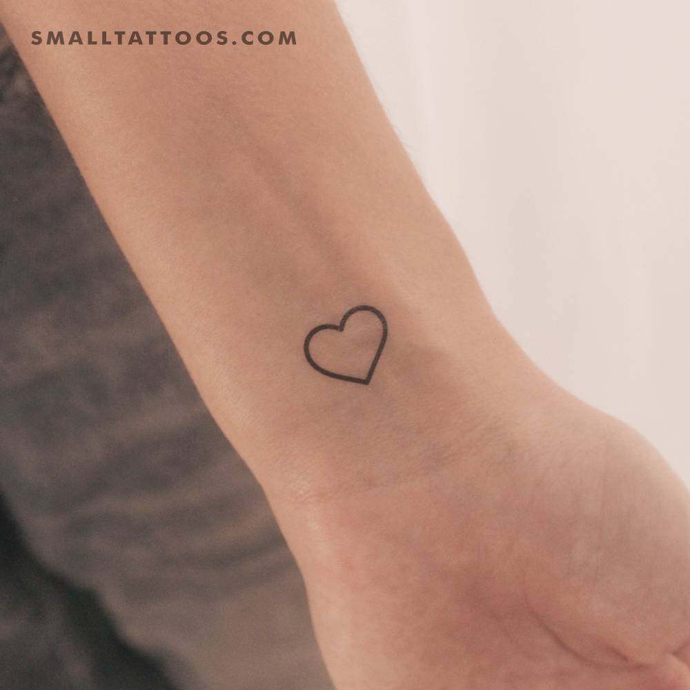 Small minimalistic heart outline temporary tattoo.