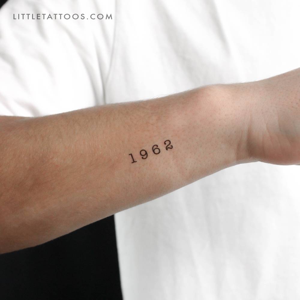 "1962" birth year temporary tattoo located on the wrist.