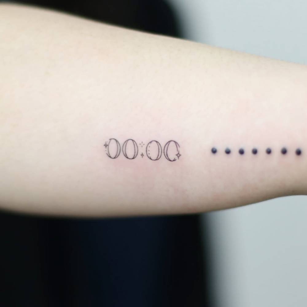 Hour tattoo located on the forearm.