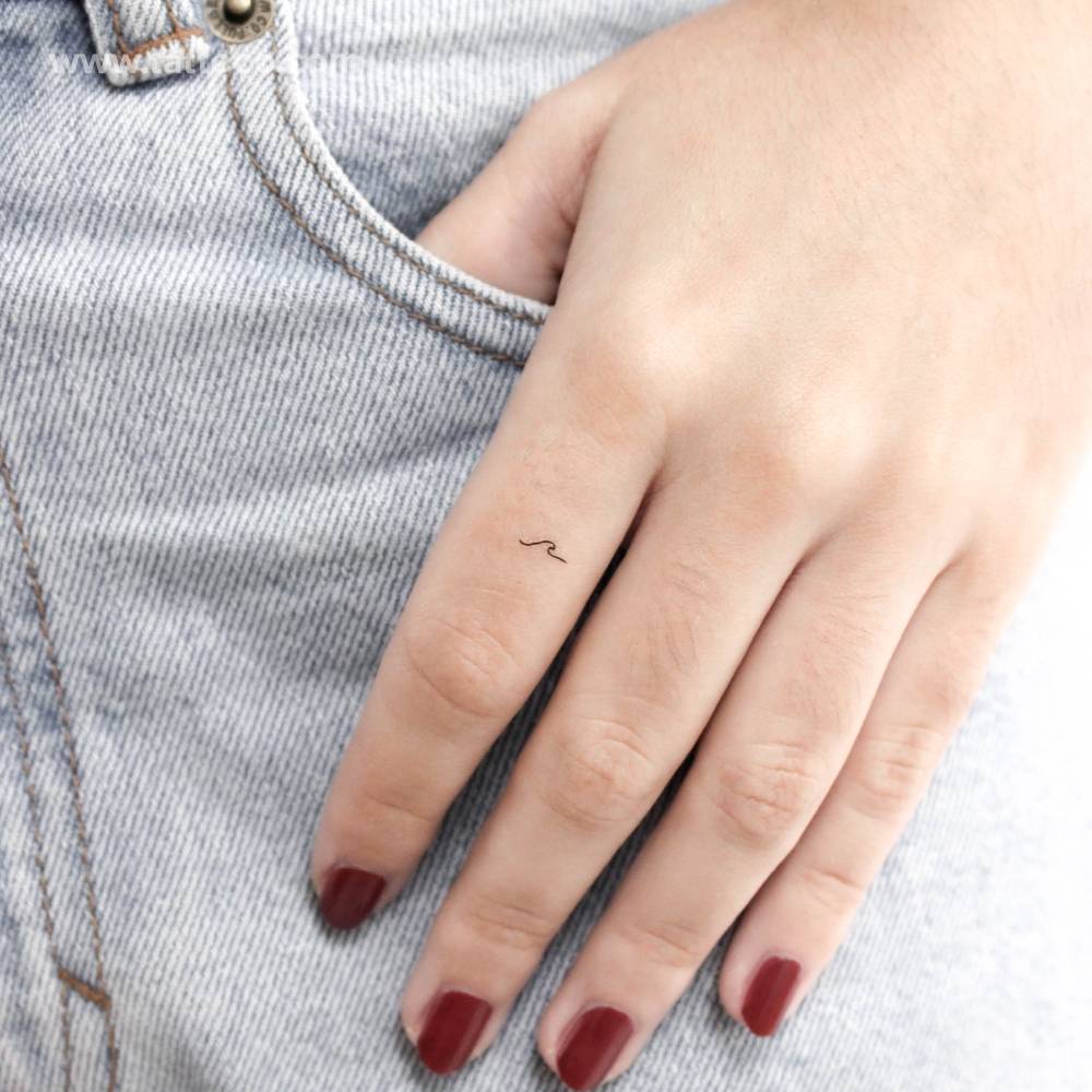 Micro wave temporary tattoo in minimalistic style.