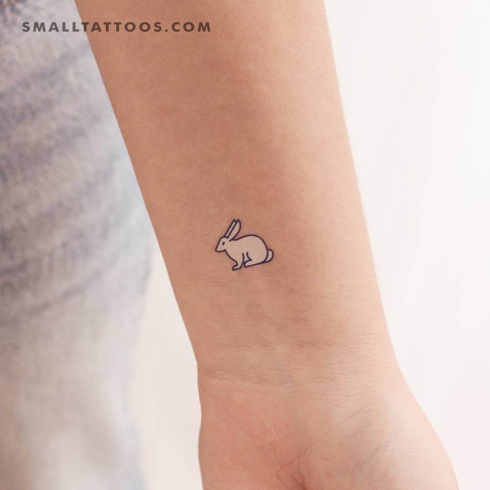 Blue rabbit temporary tattoo in illustrative style.