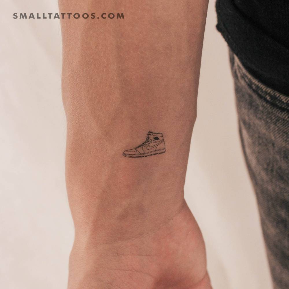 Fine line style Air Jordan 1 temporary tattoo located on the wrist.