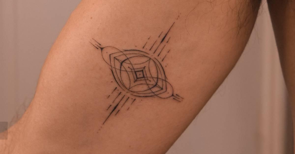 Hand poked ornamental design tattooed on the inner arm.