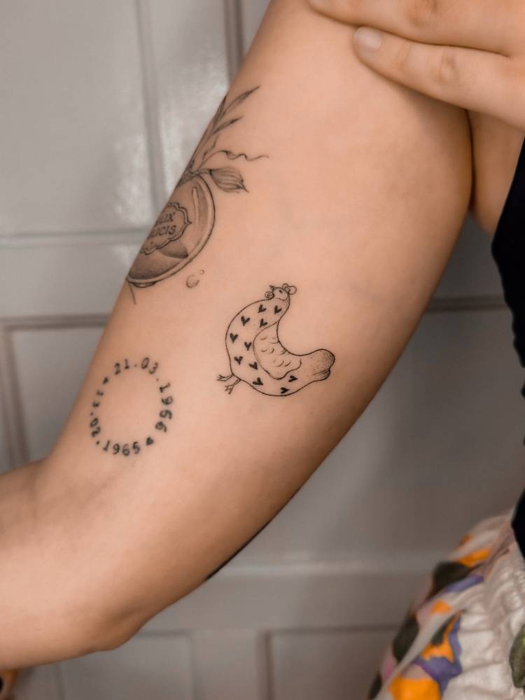 Illustrative style chicken tattoo placed on the inner arm.