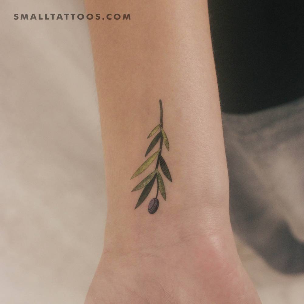Small olive branch in watercolor style by Ann Lilya temporary tattoo.