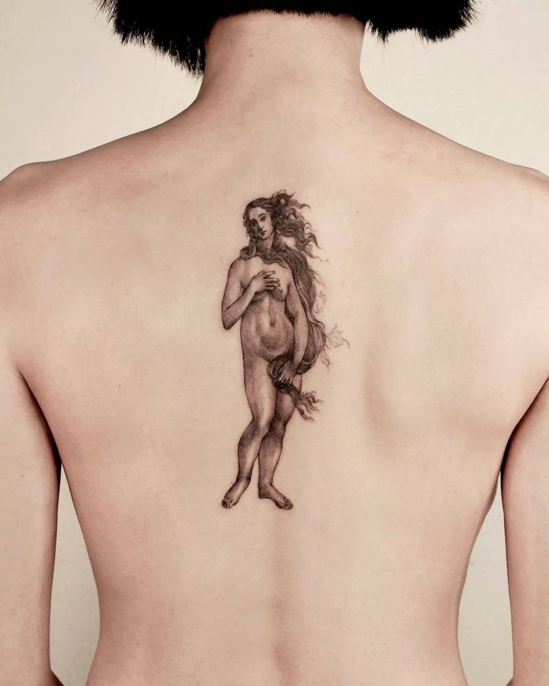 'The Birth of Venus' tattoo located on the upper back.