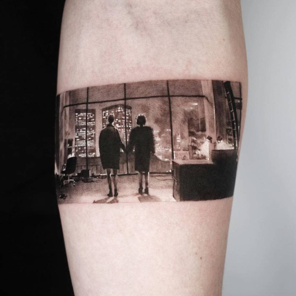 Micro-realistic Fight Club tattoo on the inner forearm.