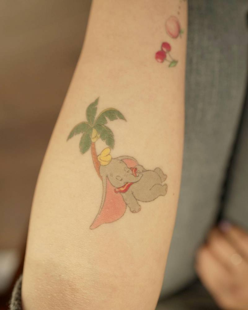 Dumbo tattoo located on the inner forearm for (1 year and 6 months healed).