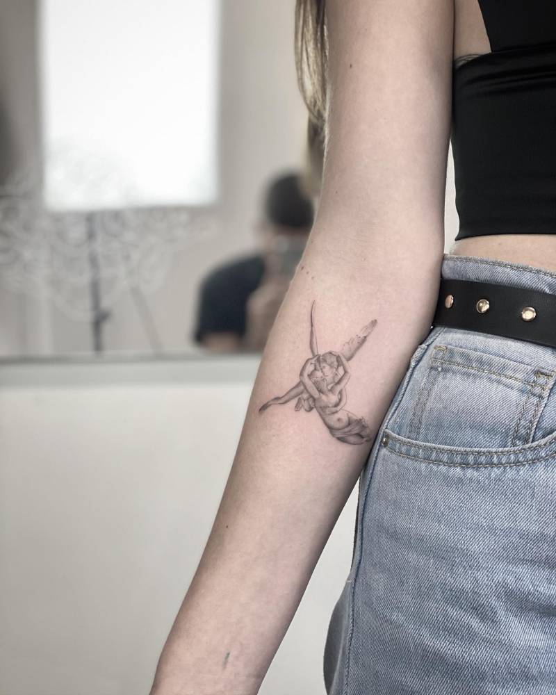 Psyche Revived by Cupid's Kiss tattoo located on the inner forearm.