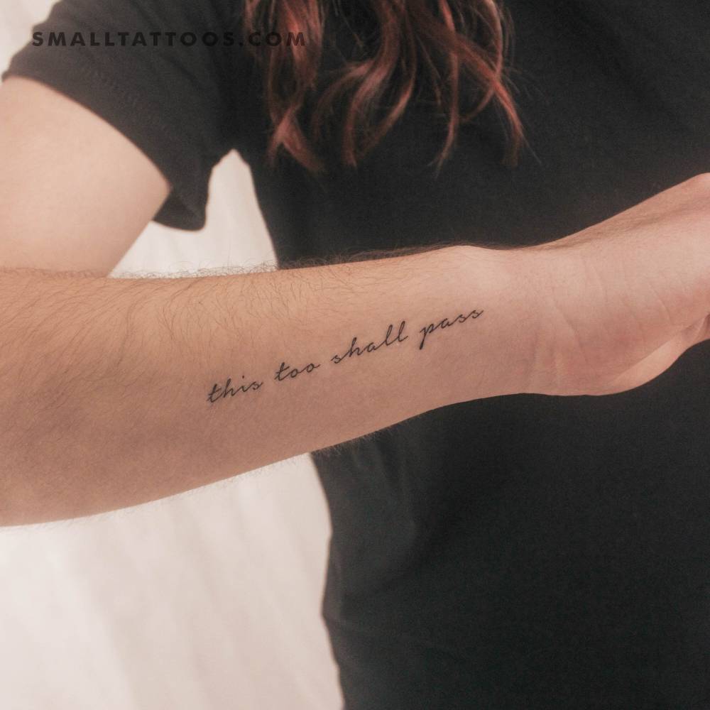 Handwritten font "this too shall pass" temporary tattoo on the wrist.