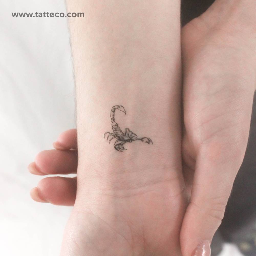 Scorpion temporary tattoo on the inner wrist.