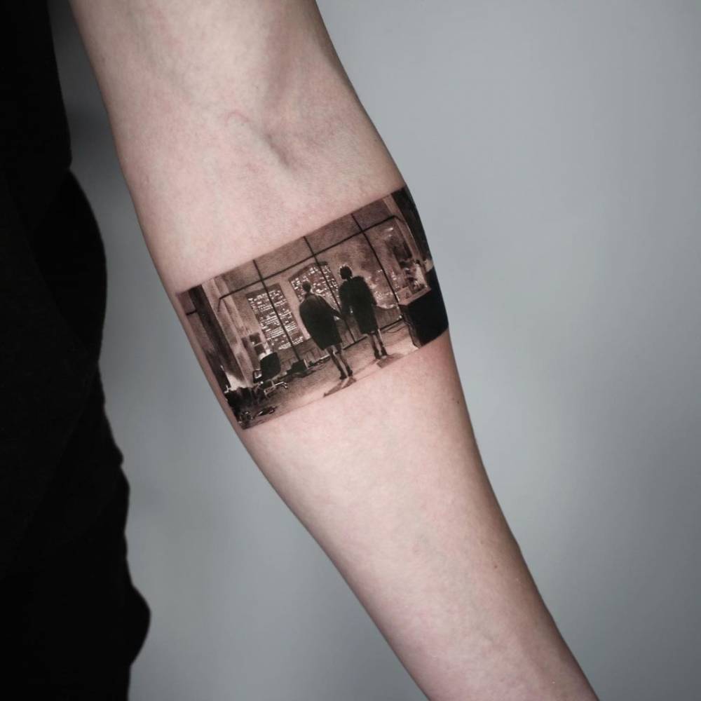 Micro-realistic Fight Club tattoo on the inner forearm.