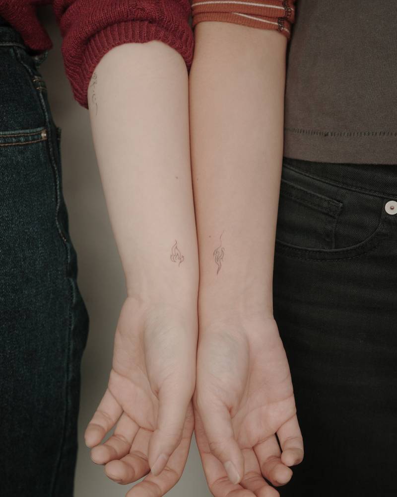 Matching fine line fire tattoo for best friends.